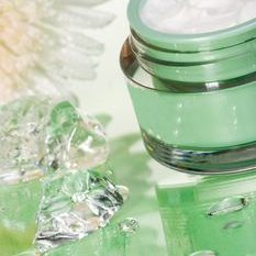 Organic facial cream in clear jar
